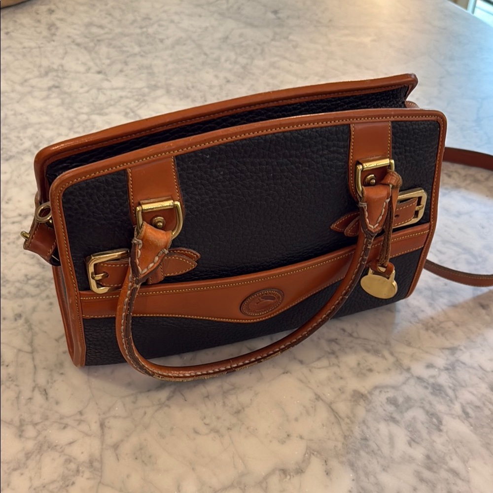 Dooney & Bourke Black and Tan Satchel with Gold Hardware, All Weather Leather